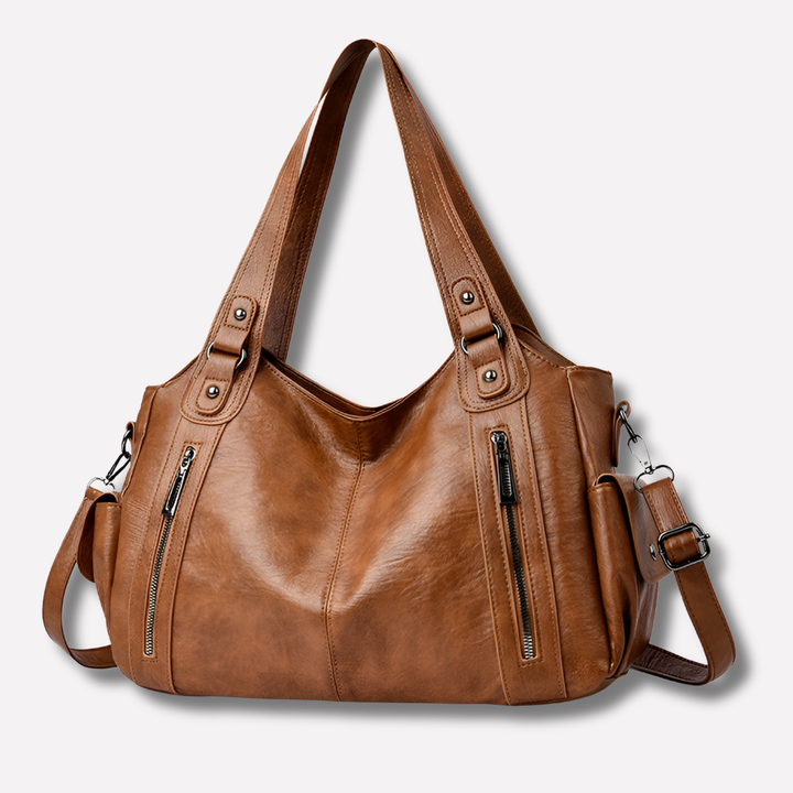 Modern women's multi-compartment work bag, designed for organized storage and sleek style.