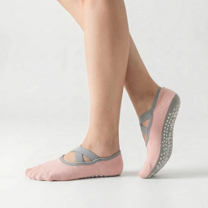 Comfortable women's non-slip yoga & Pilates grip socks for studio workouts, enhancing balance and safety.