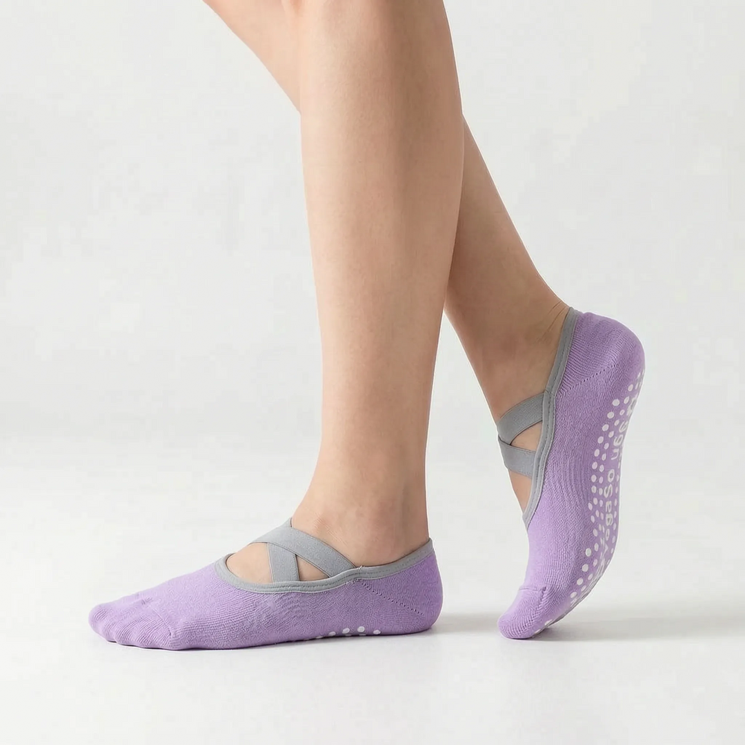 Women's non-slip grip socks, essential fitness accessory for ballet, yoga, Pilates, and dance classes.