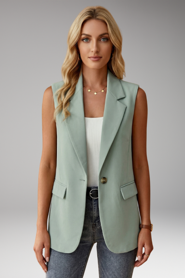 Chic women's sleeveless blazer, ideal for office layering & elegant business attire.