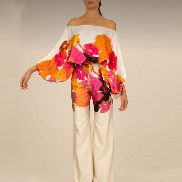 Women's matching off-shoulder summer set with eye-catching prints, great for a stylish holiday.