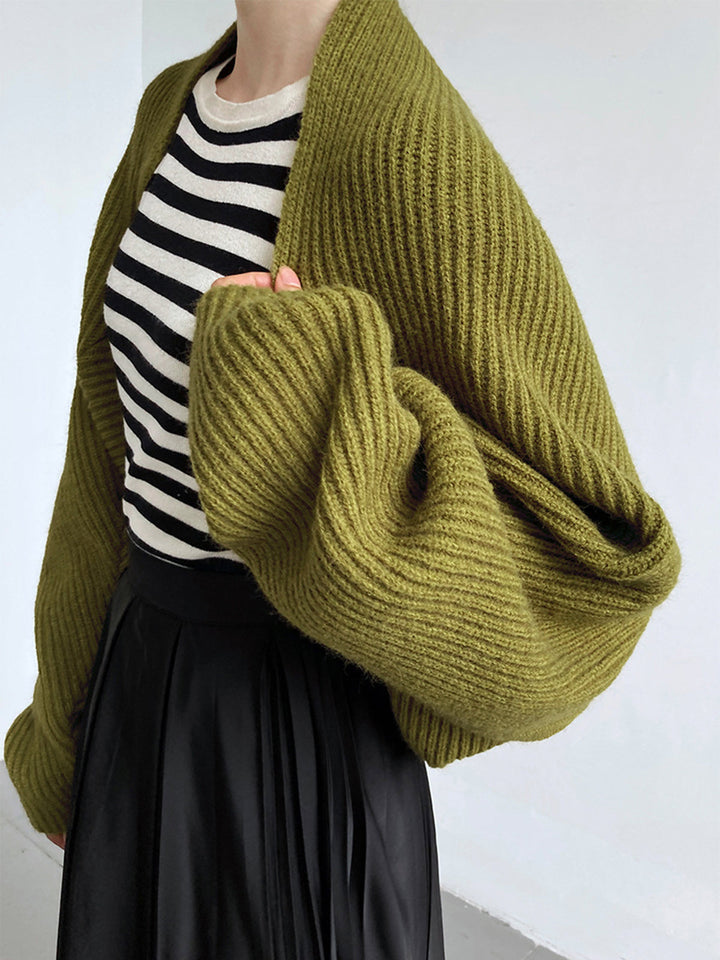 Chic long-sleeve open-front shrug sweater for women, an essential versatile layering top.