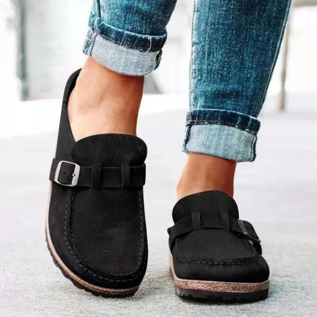 Comfortable women's orthopedic clogs featuring a stylish buckle strap, suitable for casual summer wear.