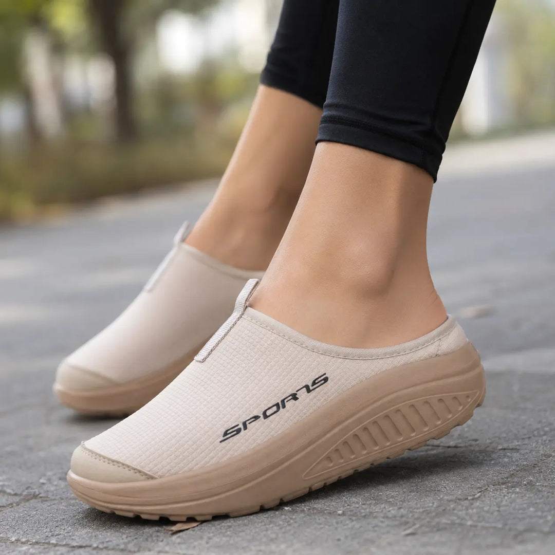 Women's comfortable closed toe slip-on slippers, orthopedic design for all-day indoor wear.