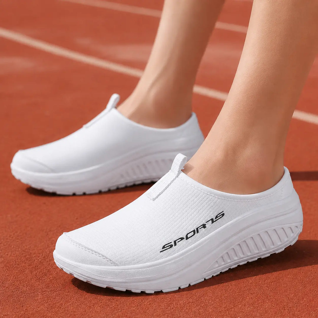 Women's supportive closed toe slip-on house slippers, orthopedic and cushioned for superior comfort.