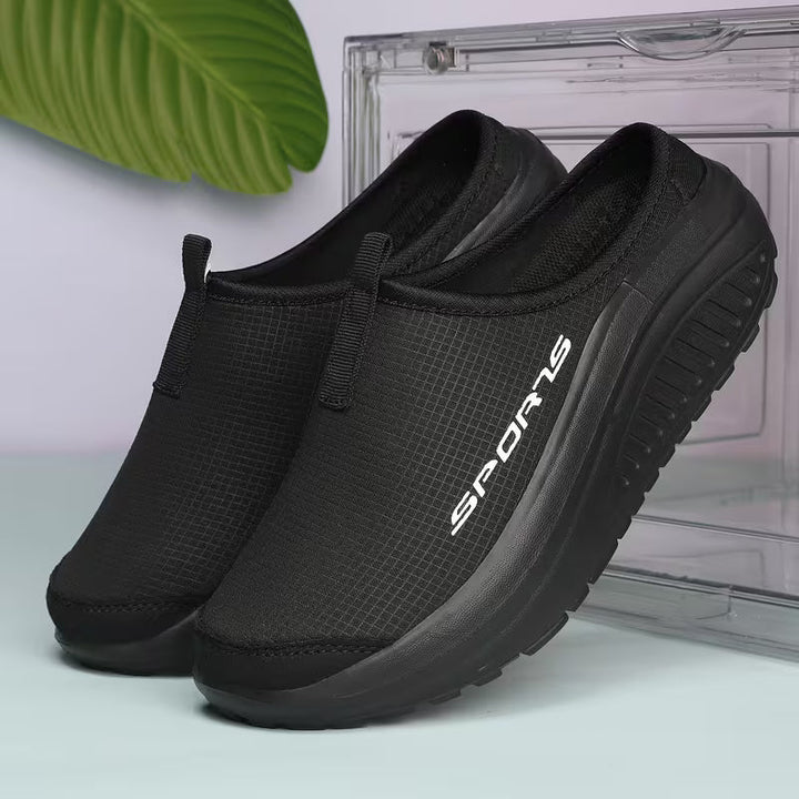 Lightweight women's closed toe slip-on slippers, orthopedic with cushioned comfort for home.
