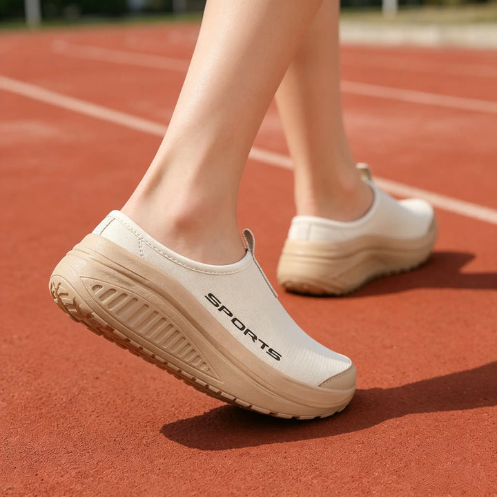 Plush women's closed toe slip-on slippers, orthopedic and cushioned for ultimate indoor comfort.