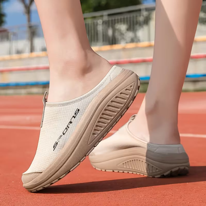 Durable women's orthopedic slip-on house shoes with a closed toe, offering excellent support.