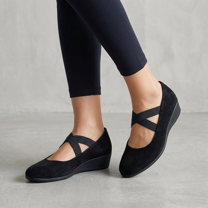 Women's orthopedic criss-cross wedge flats for all-day comfort. Elegant summer footwear with supportive straps.
