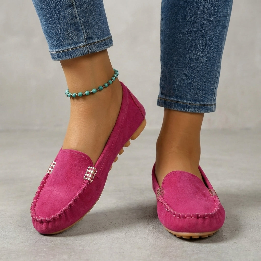 Stylish women's driving moccasins with metallic accent. Elegant slip-on loafers for spring & summer fashion.