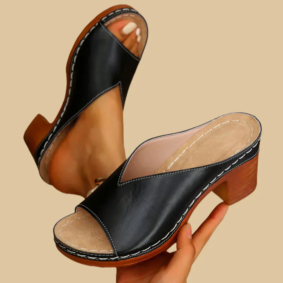 Tan leather orthopedic heeled sandals for women, designed for all-day comfort and stylish foot support.