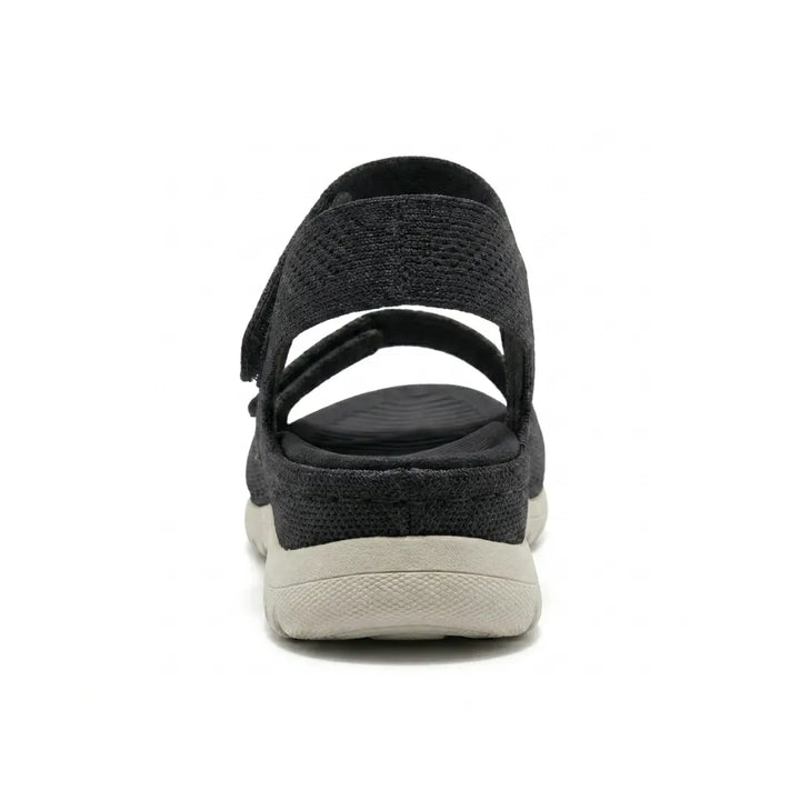 Durable women's orthopedic sandals with adjustable hook-and-loop straps & cushioned arch support.