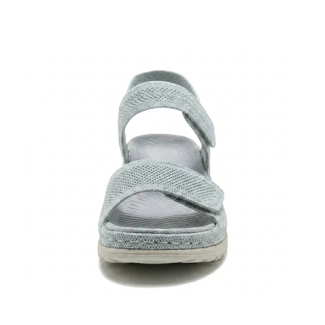 Modern women's walking sandals with adjustable hook-and-loop and effective arch support.