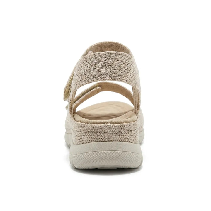 Women's orthopedic footwear: black adjustable hook-and-loop sandals with superior arch support.
