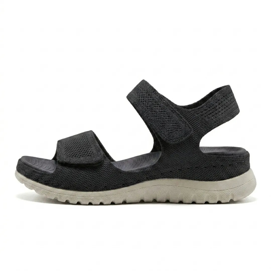 Beige women's adjustable sandals featuring orthopedic support and convenient hook-and-loop straps.