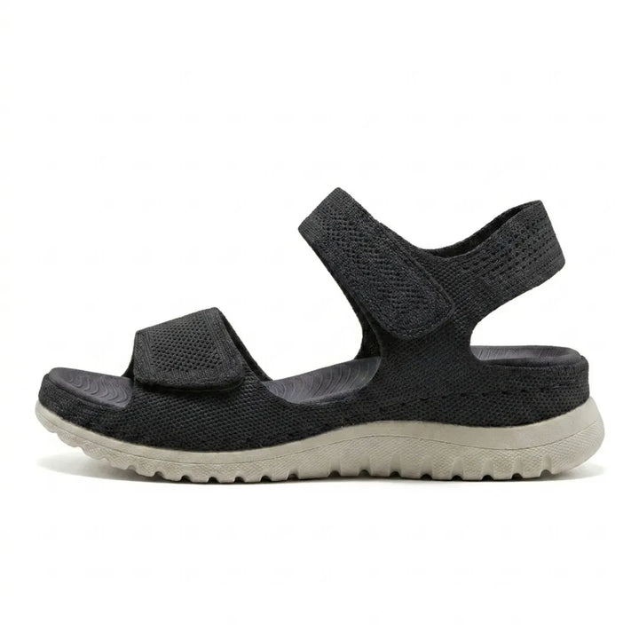 Beige women's adjustable sandals featuring orthopedic support and convenient hook-and-loop straps.