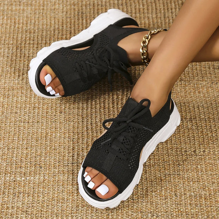Close-up of soft-strapped women's orthopedic sandals, designed for all-day adjustable comfort and support.