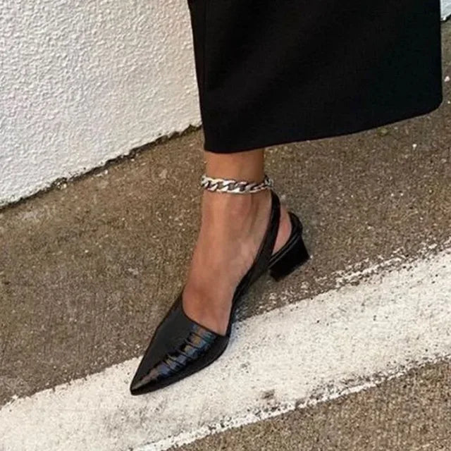 Fashionable dark brown embossed slingback heels for women. Orthopedic comfort footwear, perfect for office or evening wear.