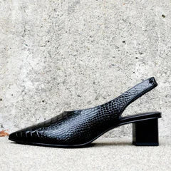 Elegant women's embossed slingback heels in a versatile shade. Orthopedic comfort and fashionable style for any occasion.