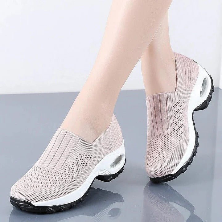 Breathable women's orthopedic slip-on shoes, offering arch & heel support for all-day pain relief.