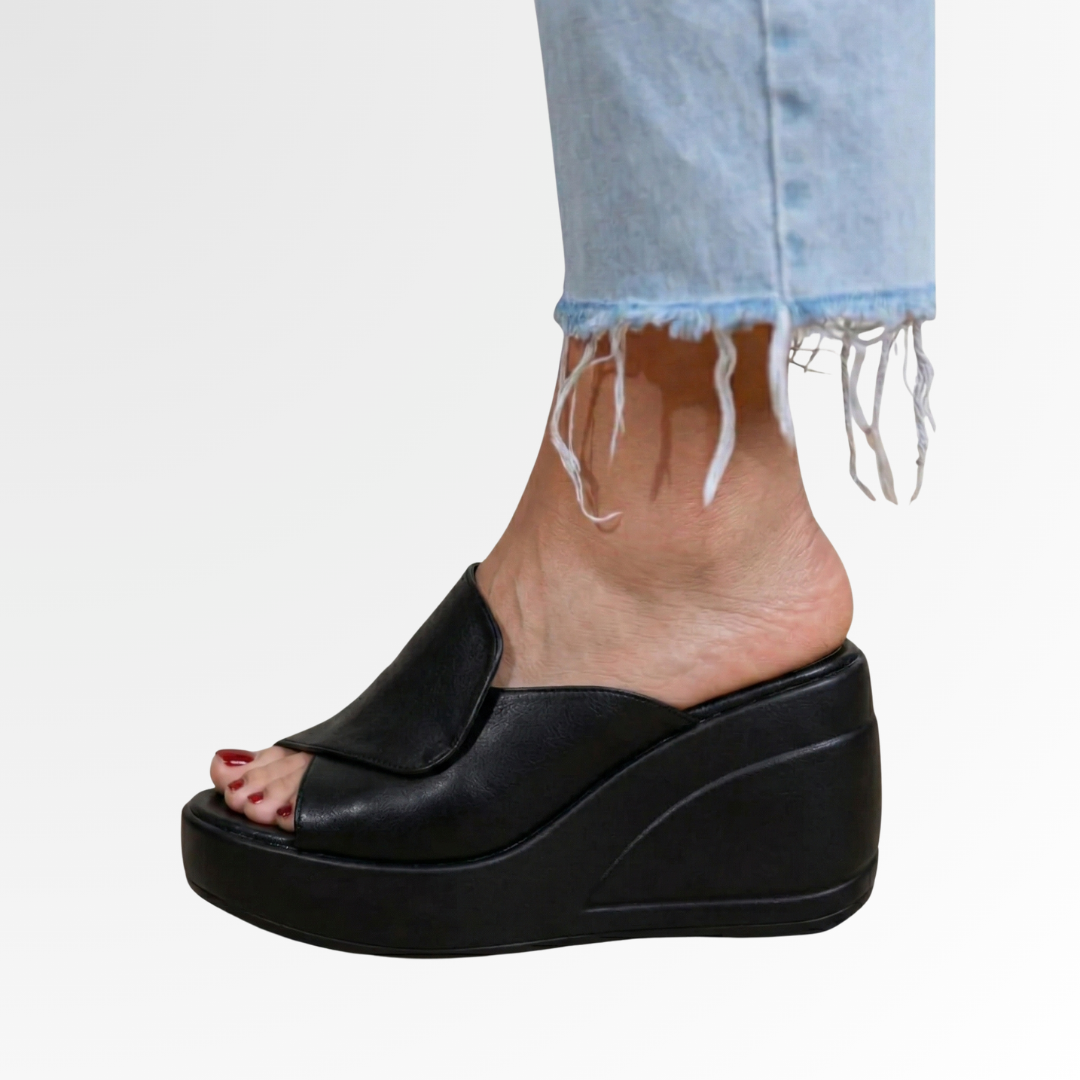 Women's orthopedic slip-on wedge sandals. Comfortable summer footwear with arch support for all-day wear.