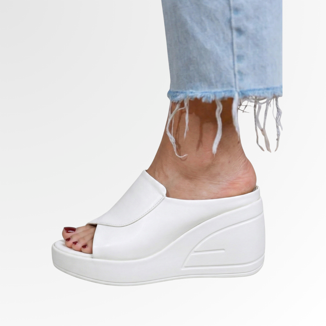 Navy women's orthopedic wedge sandals, slip-on design. Provides excellent arch support & comfort for everyday wear.