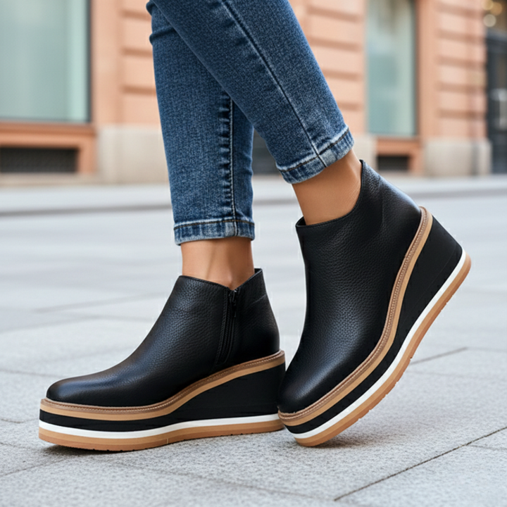 Women's platform wedge heel ankle boots, combining orthopedic comfort with a chic fall fashion design. Easy zipper entry.