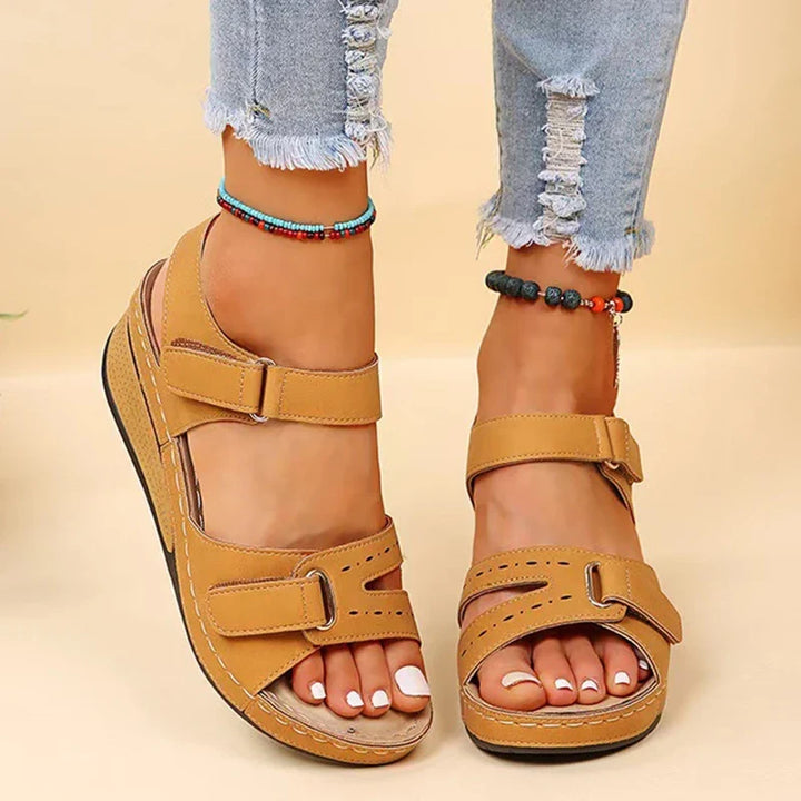 Close-up of women's orthopedic wedge sandals, highlighting ergonomic design and premium materials.