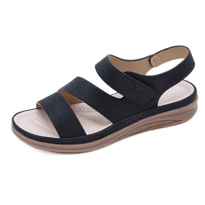 The sole of women's orthopedic wedge sandals, showing non-slip grip and supportive contours.