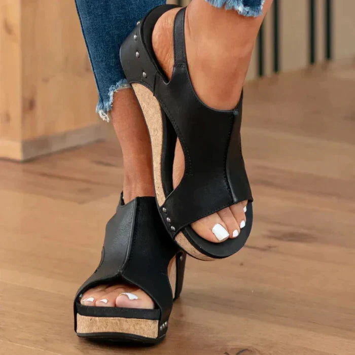 Women's fashion wedge sandals with adjustable strap, offering personalized comfortable support & style.