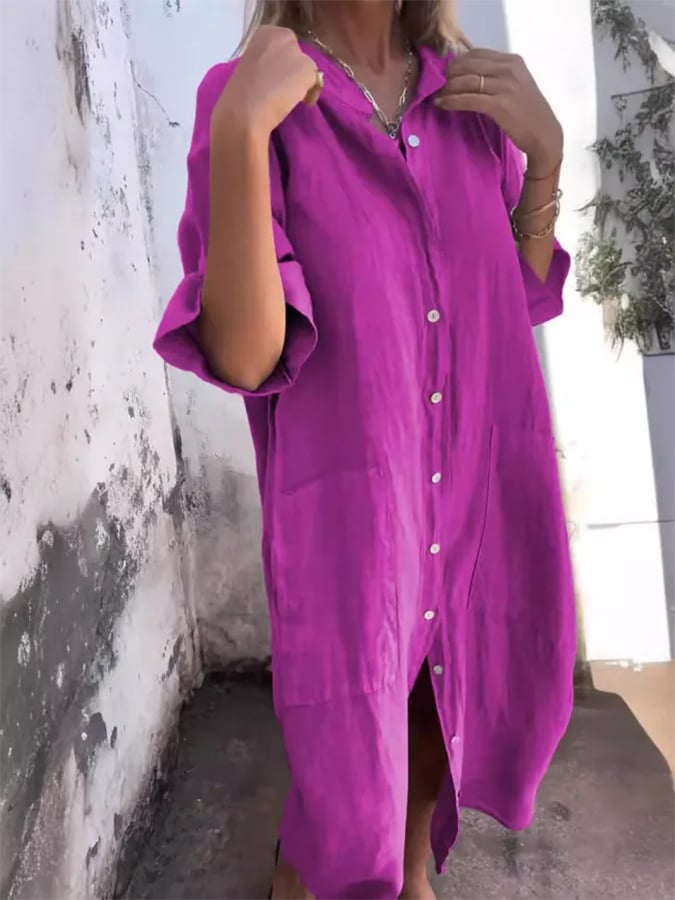 Chic women's oversized button-down midi shirt dress with pockets. Relaxed fit for versatile casual fashion.