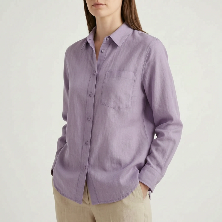 Women's relaxed fit long sleeve button-down shirt. Oversized style for comfortable, versatile wear.