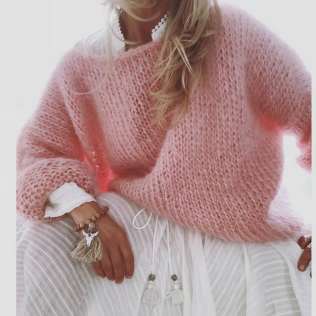 Woman wearing a relaxed fit oversized knit jumper, a comfortable and versatile casual sweater.