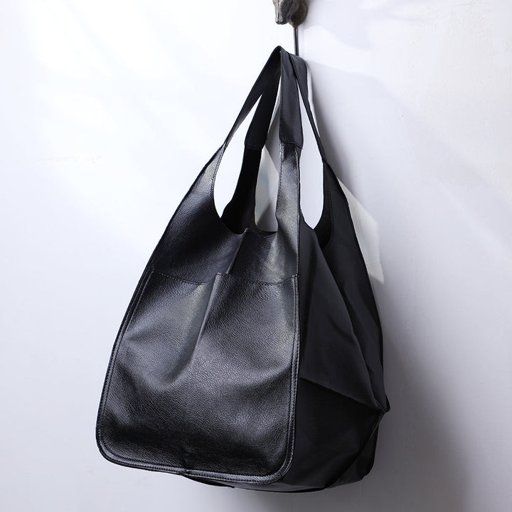 Chic women's oversized everyday bag, a versatile shoulder tote. Great for fashion, work, or spacious travel.