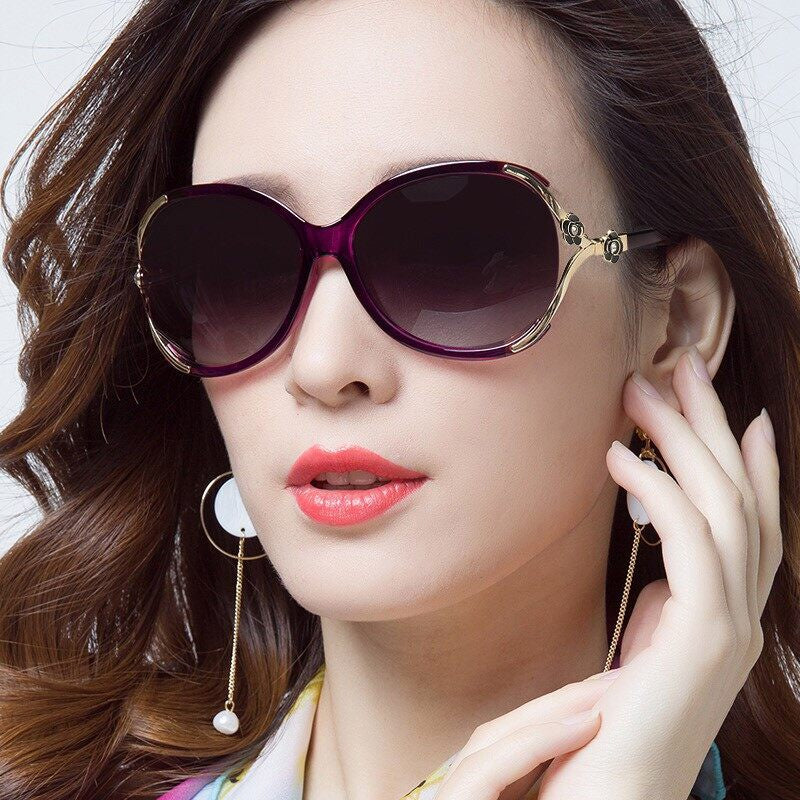 Black oversized gradient sunglasses for women, elegant rose detail, UV400 protection, acetate frame.