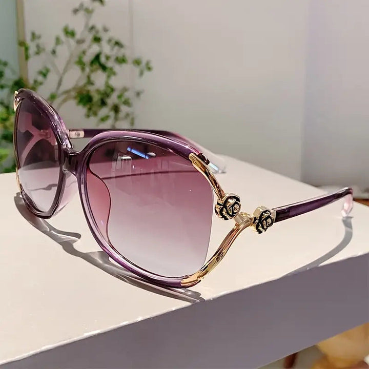 Red oversized gradient women's sunglasses, chic rose accent, UV400 protection, anti-glare.