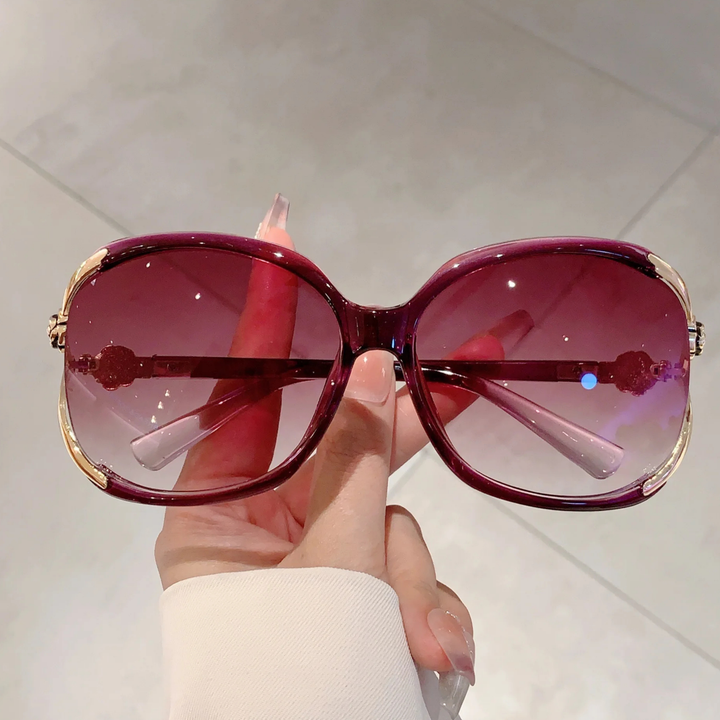 Glamorous women's oversized gradient sunglasses with rose detail, perfect fashion accessory, UV400.