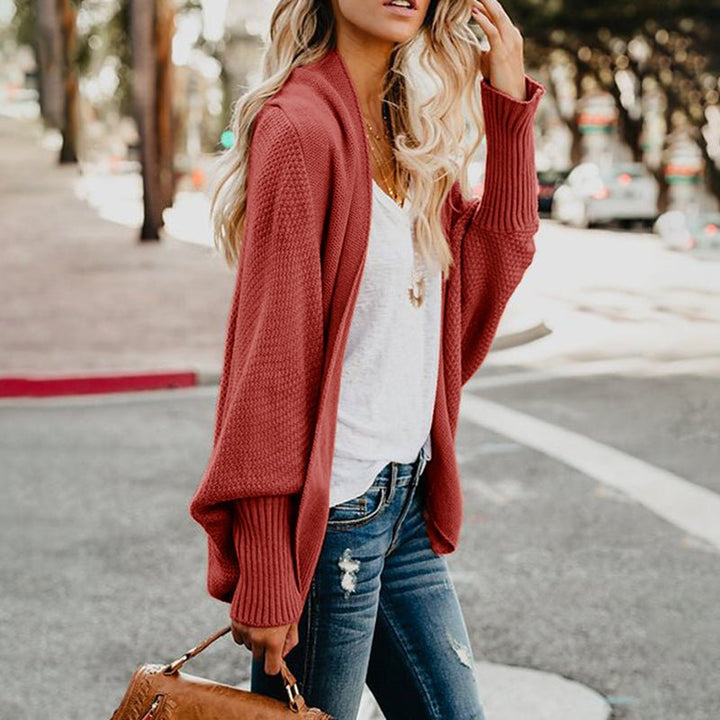 Long sleeve knit cardigan for women, offering oversized comfort and chic winter style.