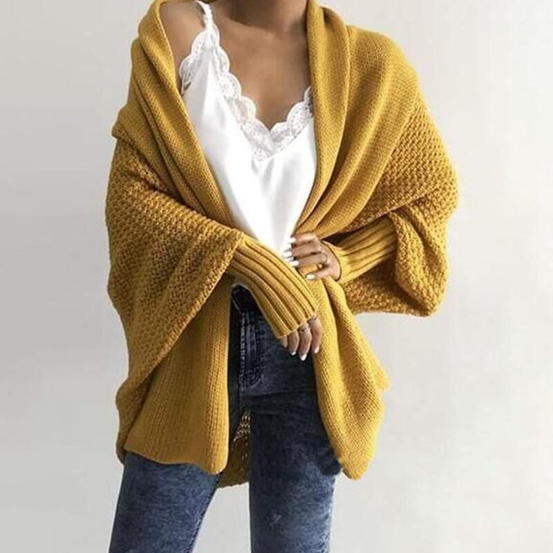 Chic oversized knit cardigan for women, perfect for cozy winter fashion & everyday elegance.