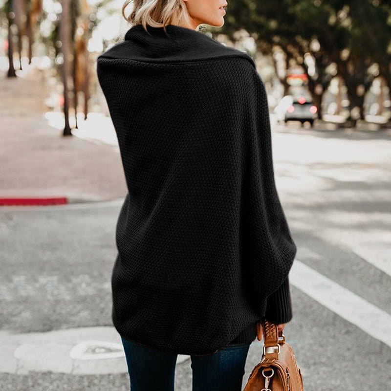 Chic long sleeve knit cardigan, offering stylish comfort for women's winter outfits.