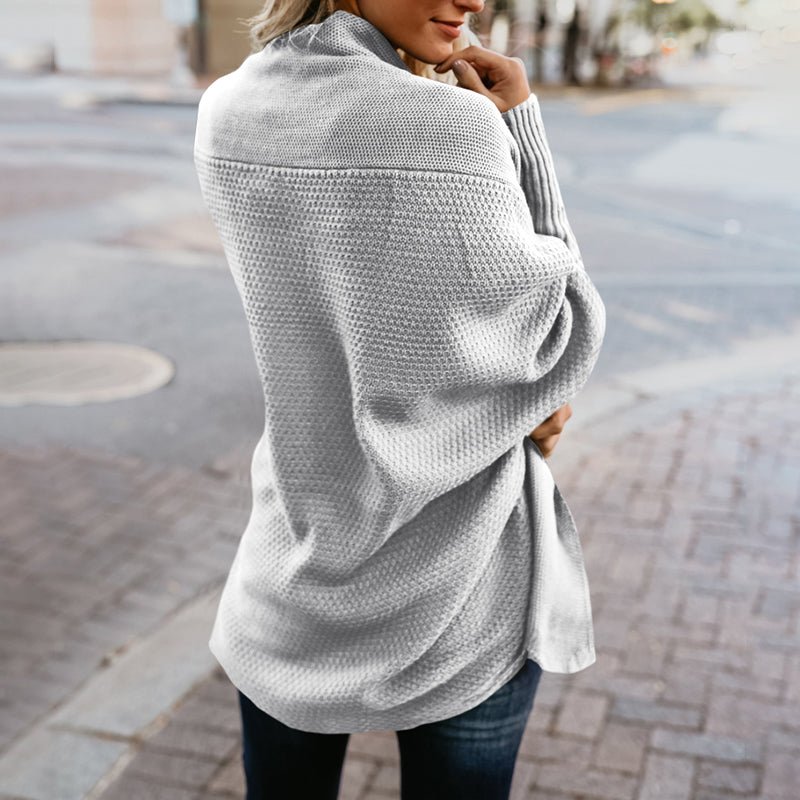 Fashionable knit cardigan for women, an oversized, comfortable layering piece for any season.