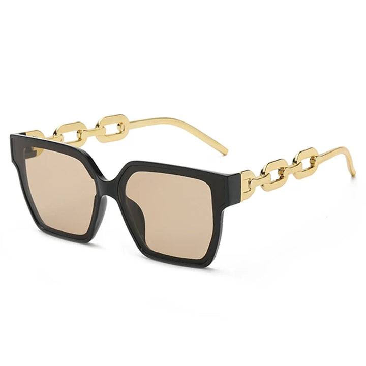 Woman wearing oversized UV400 sunglasses with striking chain link detail; perfect fashion eyewear accessory.