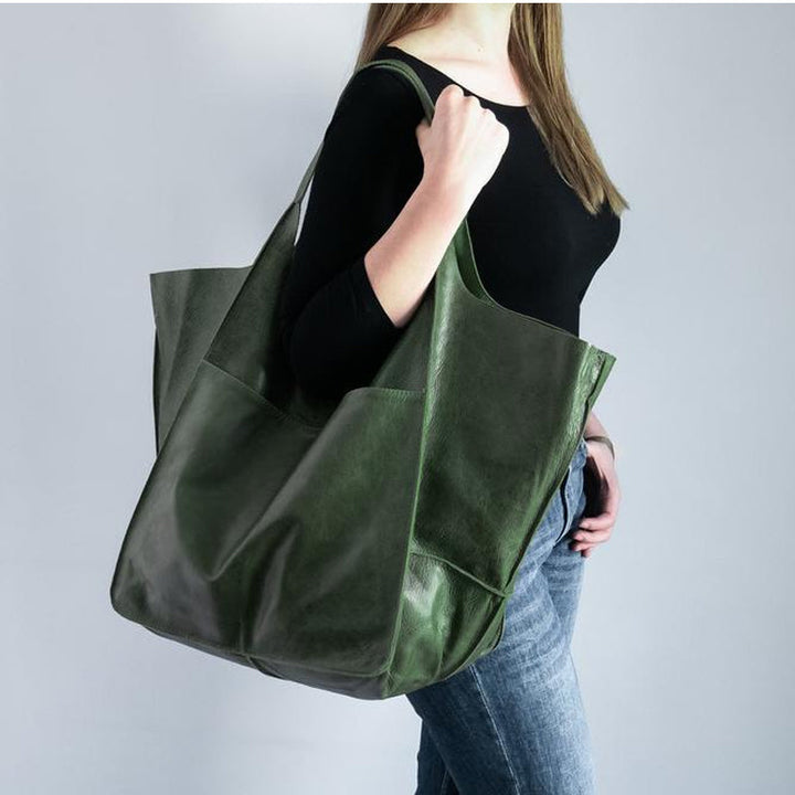 Versatile women's oversized travel bag, functions as a weekend bag & shoulder bag.