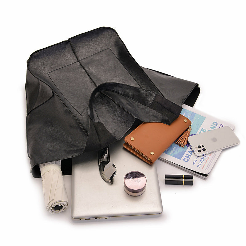 Women's oversized travel bag, packed and ready for a weekend getaway.