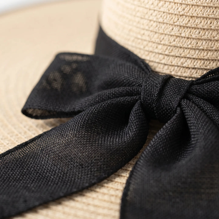 Oversized wide brim sun hat for women, offering maximum sun protection, a chic summer and resort essential.