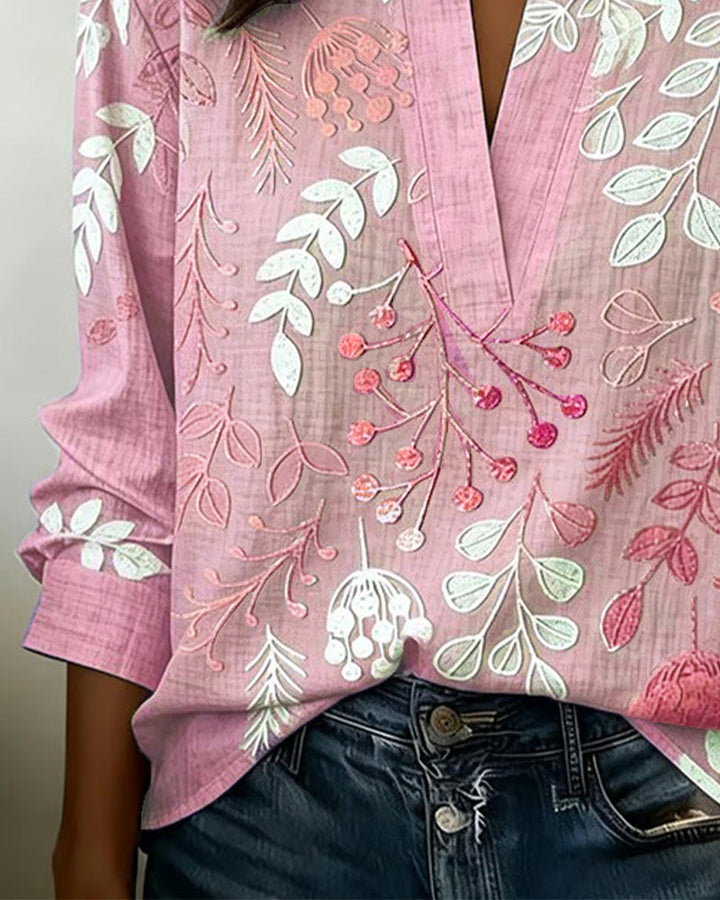 Lightweight women's pastel floral V-neck blouse, comfortable & stylish for everyday wear.