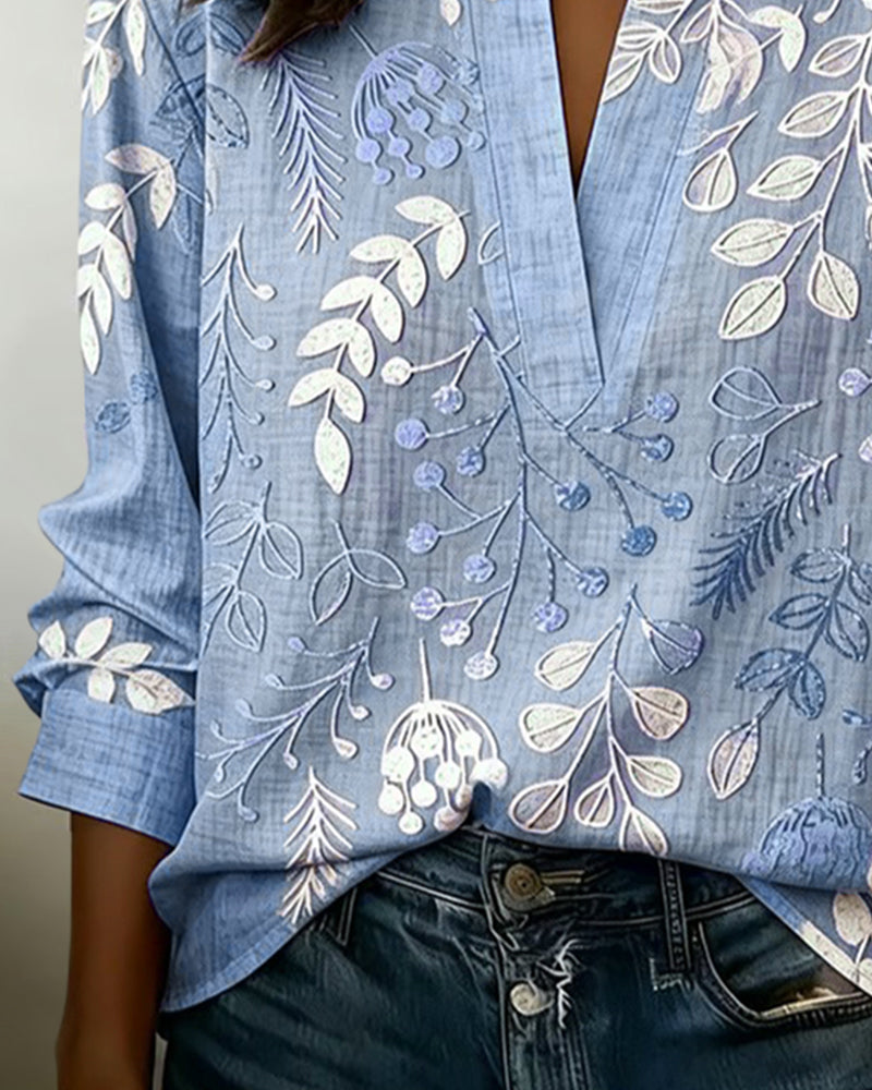 Versatile women's floral V-neck top in soft pastels, great for office casual or daily wear.