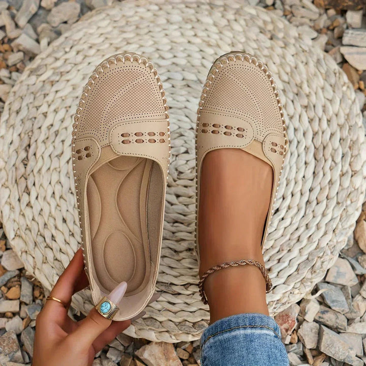Women's perforated orthopedic slip-on loafers, perfect for comfortable everyday wear.