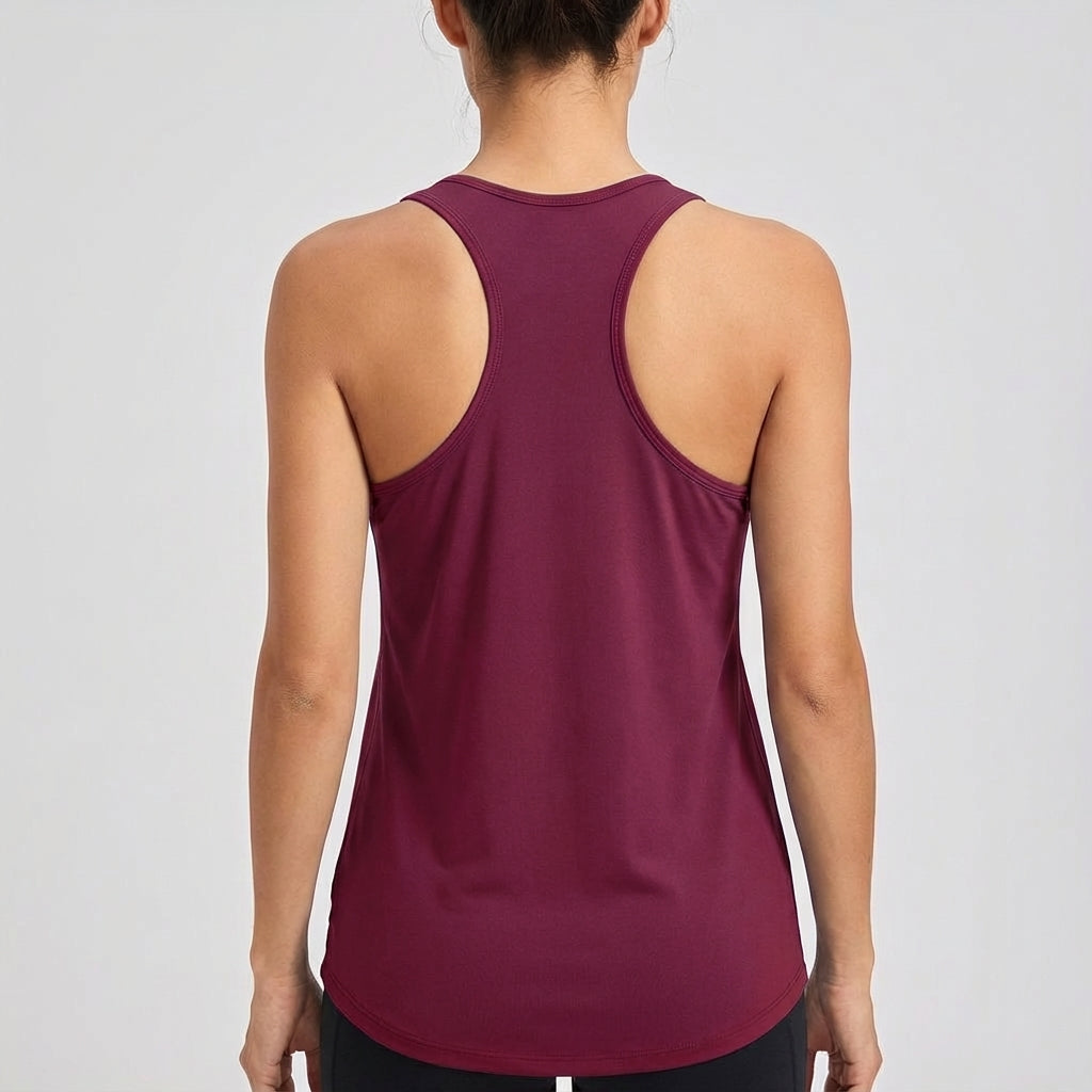 Claire women's performance sleeveless shirt. Essential workout top for fitness and active lifestyles.