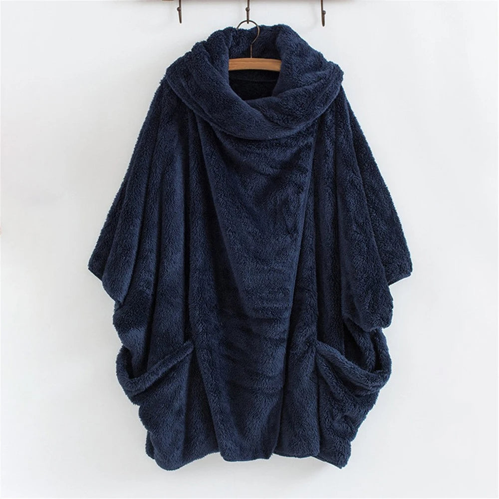 For plus-size women: a cozy, hooded windbreaker jacket. Oversized style for comfort & protection from wind.